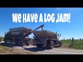 We have a Log Jam! Loading calves and spreading fertilizer