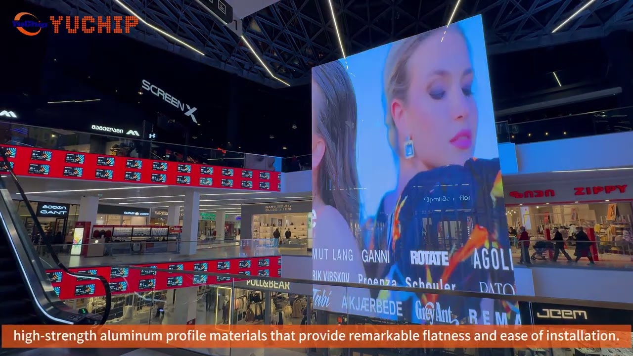 YUCHIP U-Shaped Transparent LED Screen Transforms Mall Elevator | InFiSlim P2.6