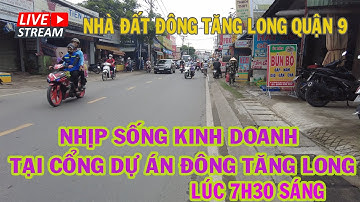 Kinh doanh tiêu dùng và nhịp sống khu đô thị vào 7h30 buổi sáng cổng dự án Đông Tăng Long