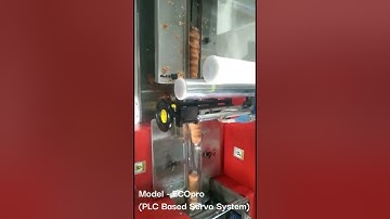 Cream Roll Mini Flow Wrap Machine. PLC Based Servo System. MODEL - ECOpro