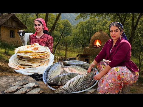 طبخ قرى الشرق الأوسط سمك مشوي على النار وخبز طيني تقليدي