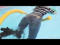 Jeans and boots in pool