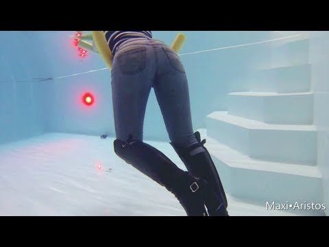 Jeans and boots in pool