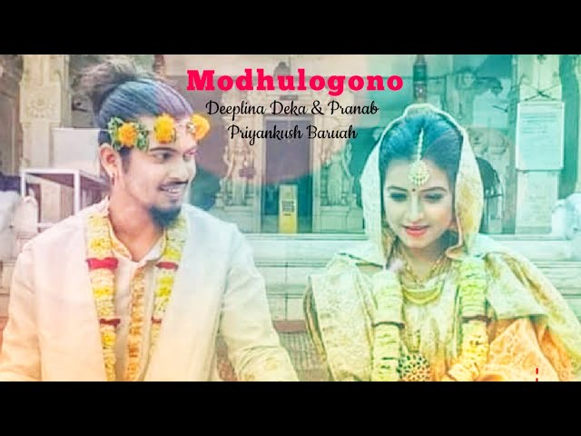 Modhulogono II Assamese Lyrical Video Song II Deeplina Deka II Pranab Priyankush Baruah II class=