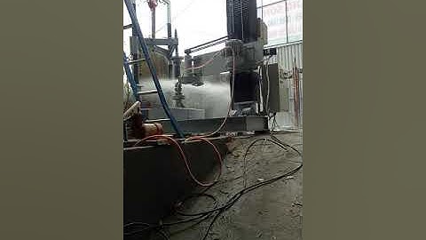 Máy tiện đá tự động CNC