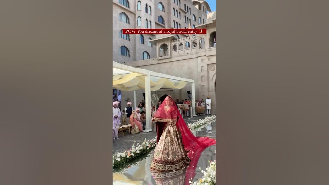 Dhol Beats and Floral Aisle: A Dreamy Bridal Entry for Varmala Dhol Beats and Floral Aisle: A Dreamy Bridal Entry for Varmala