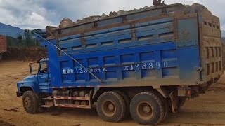 Extremely crazy overloaded truck. Guess how heavy it is