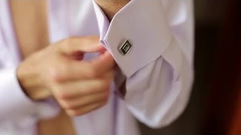 Put On Cufflinks Stock Video