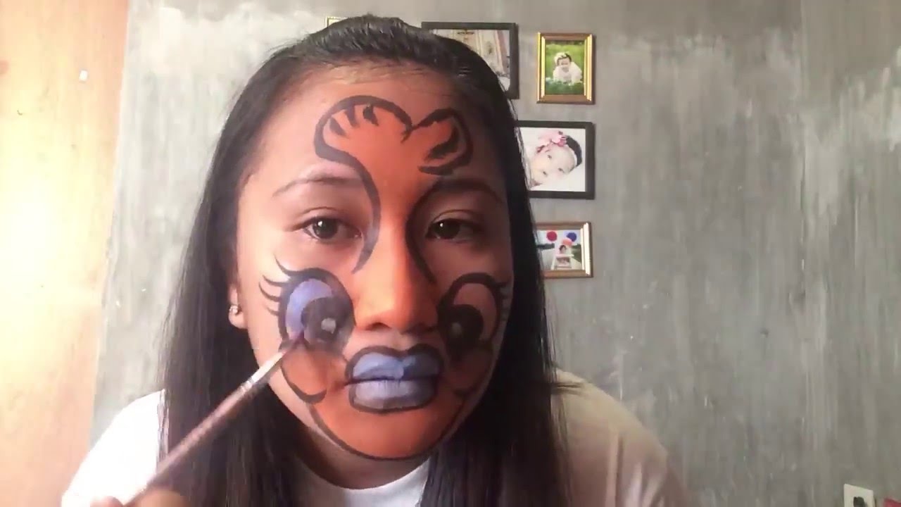 Time lapse -fish face paint - YouTube