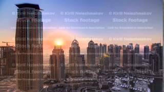 Sunrise in Dubai Marina with towers and harbor with yacht from skyscrapper, Dubai, UAE timelapse 4K