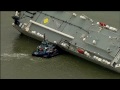 Stunning Image of Cargo Ship Carrying Luxury Cars Grounded