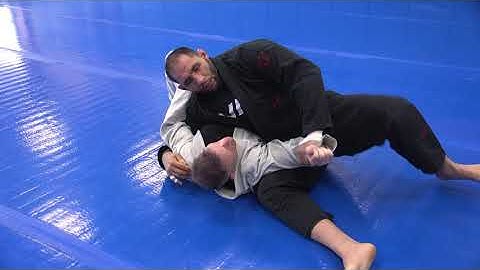 Armbar from side control using legs