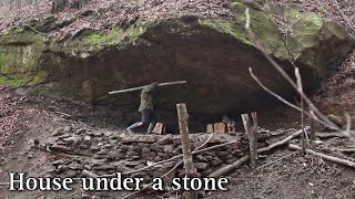 The beginning of the construction of the house under the stone. Part 1