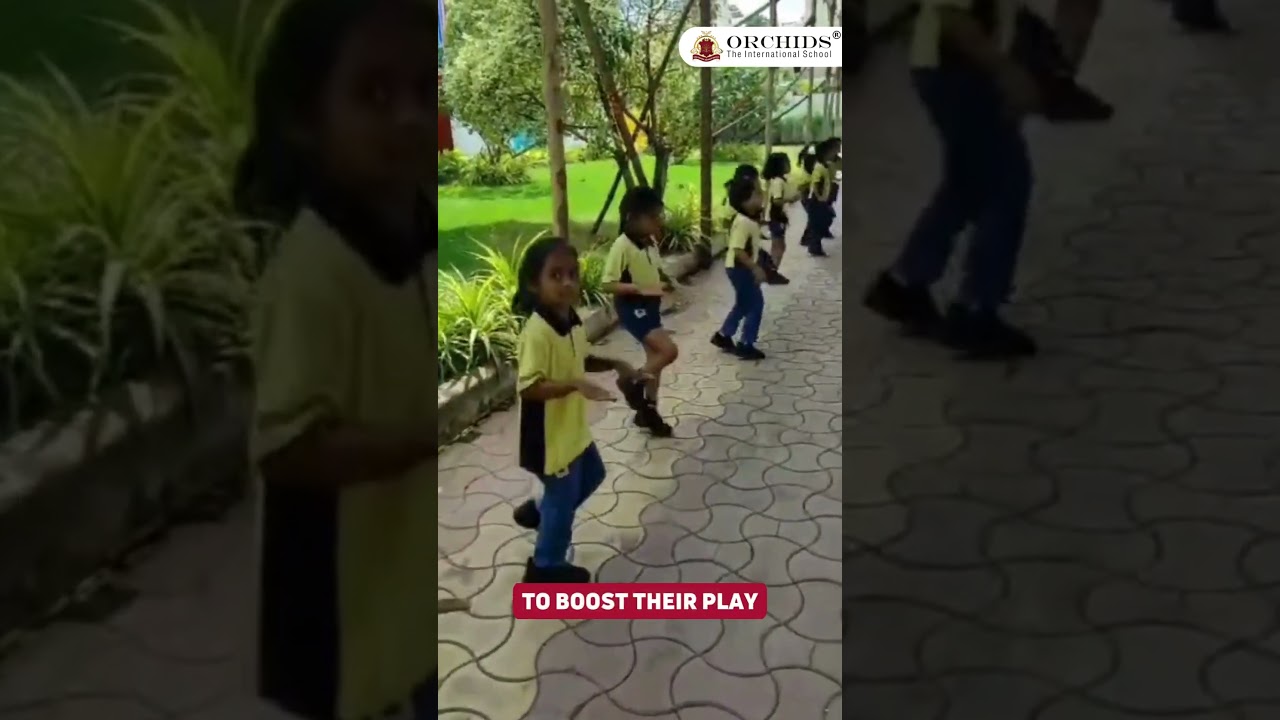 Tiny tots engage in warm-up exercises