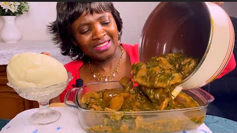 African food cow skin +smoked chicken +okra mixed with vegetable and Fufu/eating show notalking