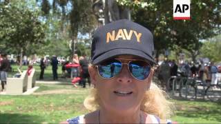 Crowds Line Streets to Honor US Navy SEAL
