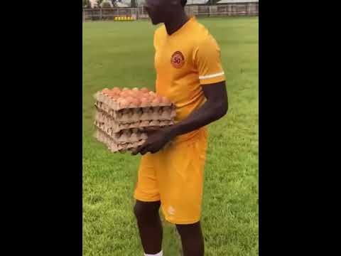 KENEDY MUSONDA WHEN AWARDED 5 TRAY OF EGGS AFTER BEING NOMINATED PLAYER OF THE MATCH IN ZAMBIA 