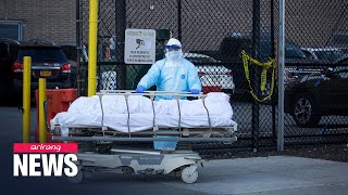 New York s virus death toll tops while Wuhan ends lockdown