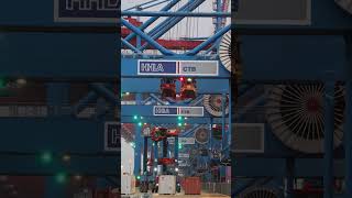 Straddle carrier picking up a container