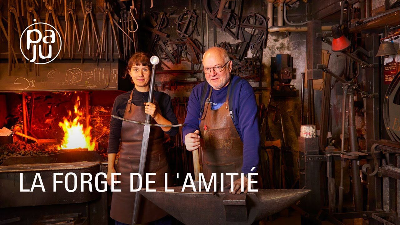 &quot;Dans une forge du Lavaux, à Chexbres (Suisse), une artiste enthousiaste et un ferronnier d’art un peu ours, s’associent dans leur passion pour battre le fer et créer des pièces uniques. 
