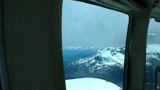 Bumpy Cessna flight amongst mountain tops Patagonia en Chile