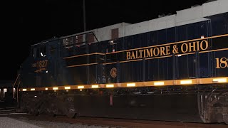 CSX 1827, B&O Heritage, Leads A Highballing I031 By Dunn