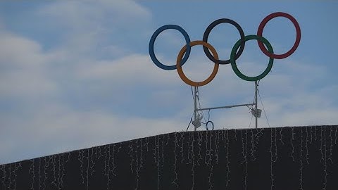 Olympic torch relay begins historic journey