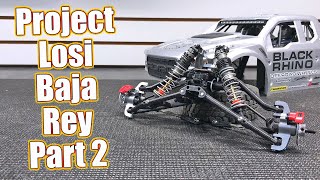 Radical Losi Baja Rey Build Part 2! Installing Front Suspension & Gearcase Option Parts | RC Driver