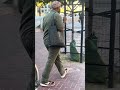 Man carrying a very black bag in San Francisco