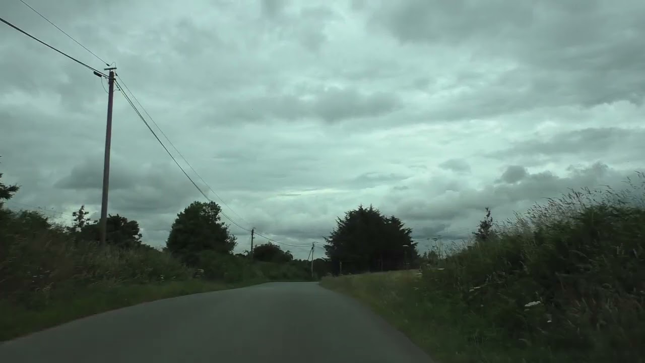 Driving On The D28 From 22160 La Botcol To 22160 Maël Pestivien, Brittany France 7th July 2024
