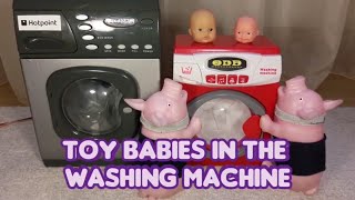Toy babies in the washing machine by happy pigs (toy machines
modified)
