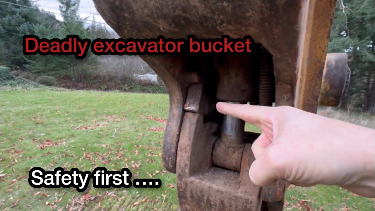Excavator bucket, falling off to kill… - YouTube