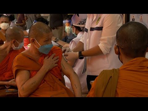 Buddhist monks receive AstraZeneca vaccine in Thailand