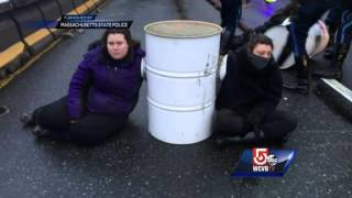 5 Investigates: Protesters handcuffed together through cement-filled barrels