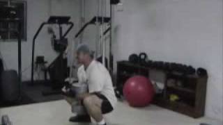 Dumbbell Zercher Squats