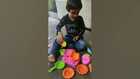 toys cocking playing Nancy