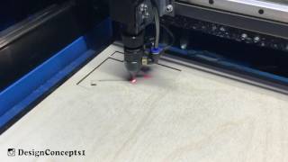 50w laser cutter cutting out a iPad/tablet stand with settings