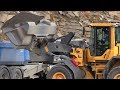 Volvo L90H | Loading Scania and Volvo trucks in quarry