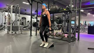Heel Elevated Dumbbell Suitcase Squat