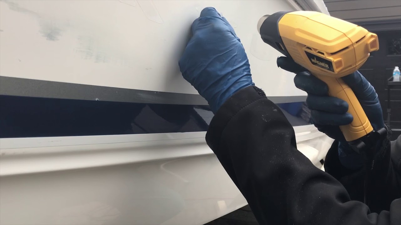 how to remove vinyl boat lettering with a heat gun - youtube