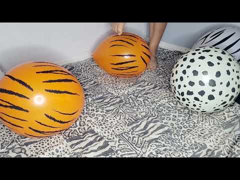 Popping animal print balloons with bare feet