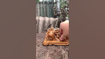 Tượng phật di lặc kéo bao nhất phúc gỗ bách xanh dài 20cm