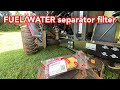 How to replace the FUEL WATER SEPARATOR FILTER on a Yanmar SA325 Tractor.