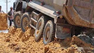Big dump truck fails recovery by Komatsu Bulldozer ឡានយីឌុបដឹកដីជាប់ផុង រុញចេញដោយអាប៉ុល