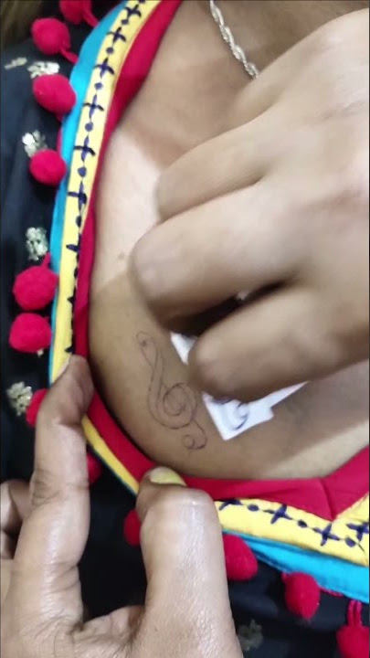 Breast Music Symbol Tattoo - Myna Tattoo Studio - Best Female  Tattoo Studio Bangalore