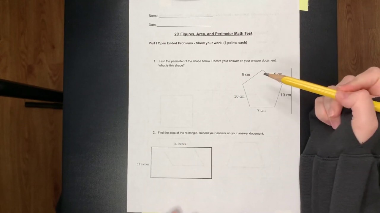 Ms. Curtin explaining Questions 1-6 on our 2D figures, Area, and Perimeter Test