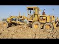 លីប៊័រល័រធ្វើផ្លូវ - Motor grader grading road in Cambodia