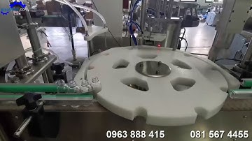 Máy chiết rót vặn nắp dán nhãn chai tinh dầu