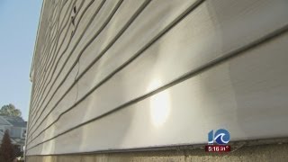 Vinyl siding melts off from reflection of sun at Virginia Beach home