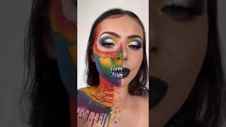 Artist creates a unique rainbow skeleton look on one side of her face